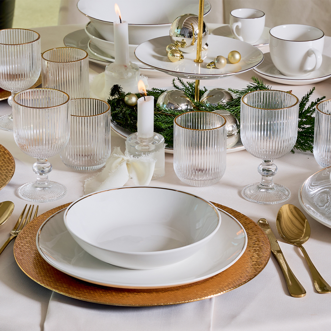 Piatti e bicchieri filo oro Tognana